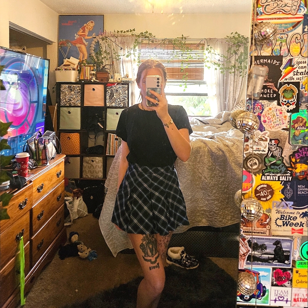 Pleated black, blue and white mini skirt; size small